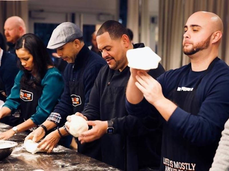 Pizza Making Team Building | Man Tossing Pizza Dough