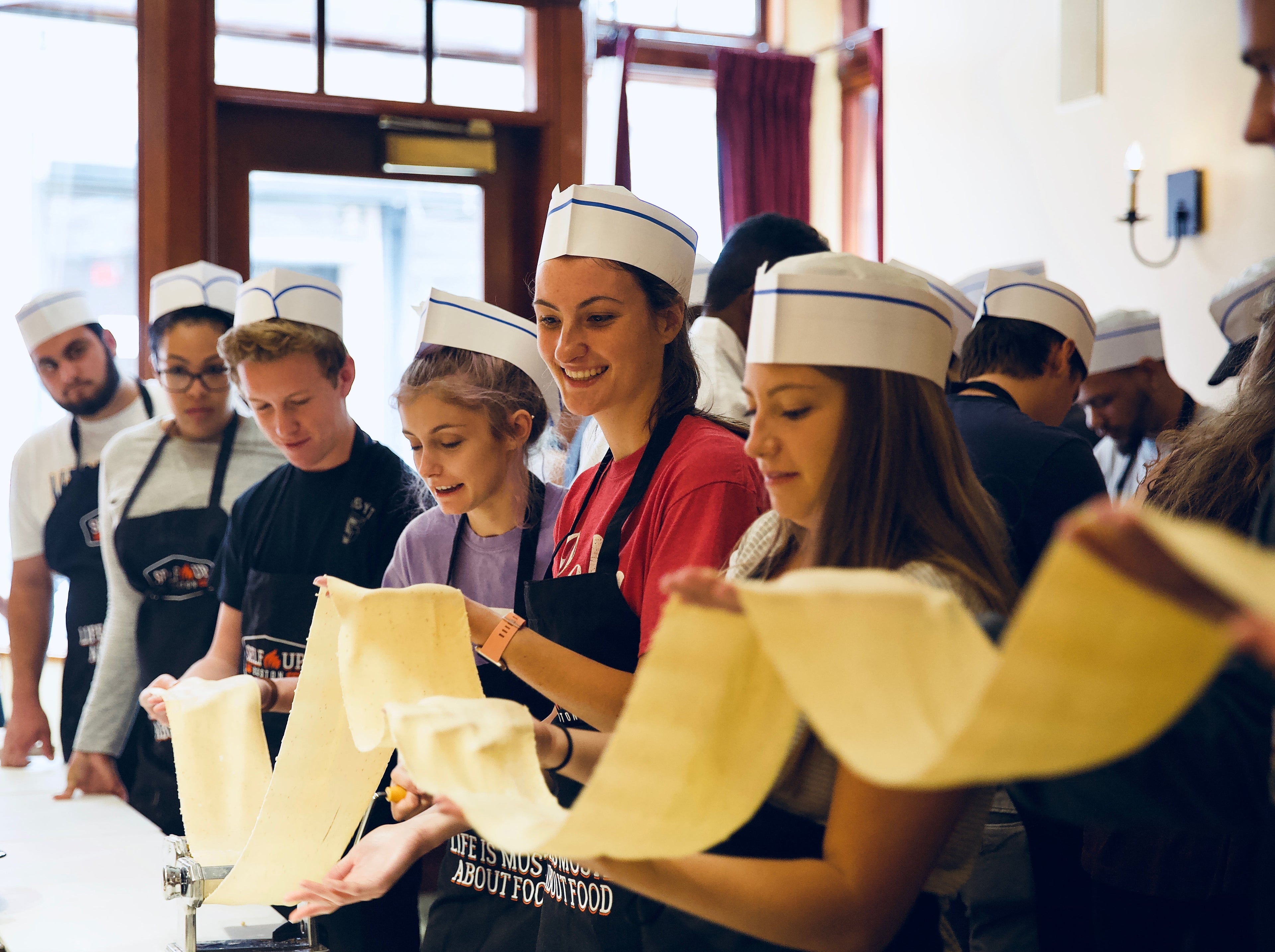 Cooking classes for Adults | People holding dough