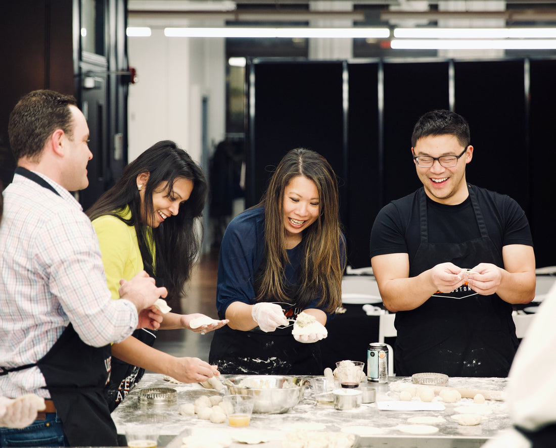 Fun team building activities | people cooking