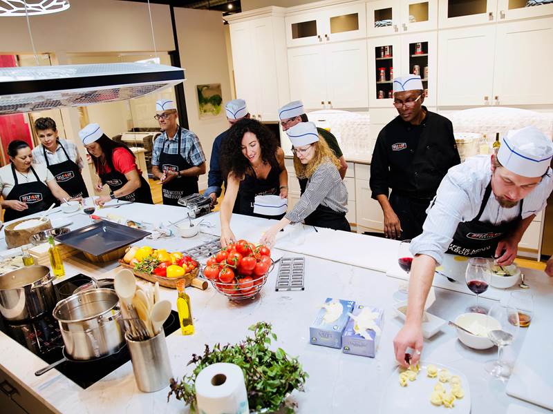 Why You Should Try a Corporate Cooking Class | team cooking